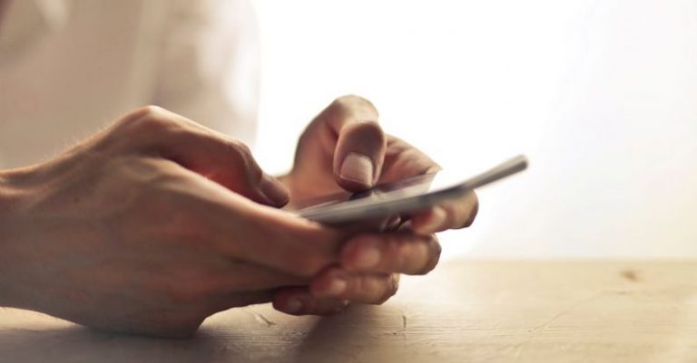 Digital - Person Using Smartphone