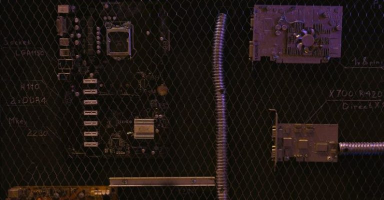 Tech Integration - Circuit Board Behind a Wire Mesh