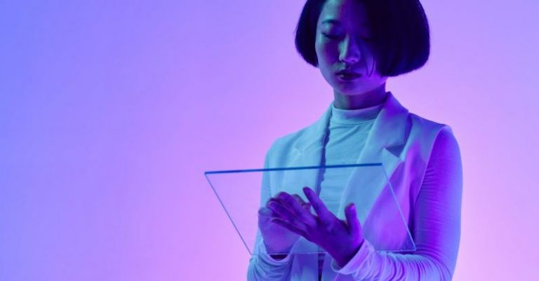 Automation Insights - A Woman Holding a Digital Tablet