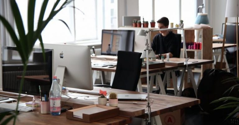 Workplace - Man Sitting in Front of Computer