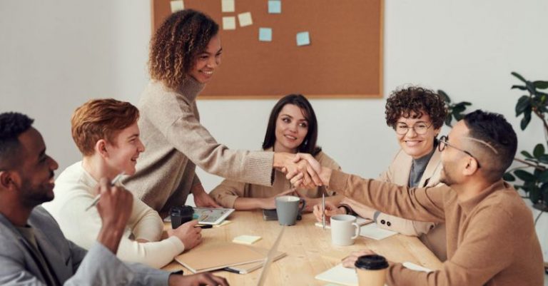 Workplace - Colleagues Shaking each other's Hands