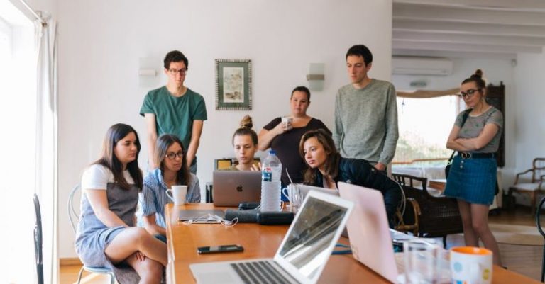 Workplace - Group of People Watching on Laptop