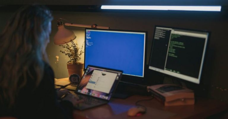 Cybersecurity Measures - Woman Using a Computer
