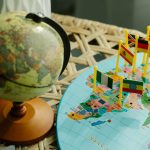 globe-and-a-flat-world-map-with-country-flag-markers