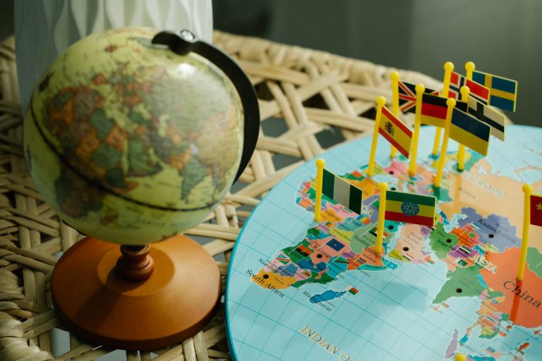 globe-and-a-flat-world-map-with-country-flag-markers